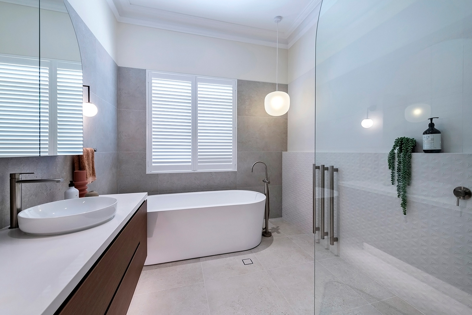 Bathroom in Costtesloe apartment with cabinetry designed by Studio Seventy Four